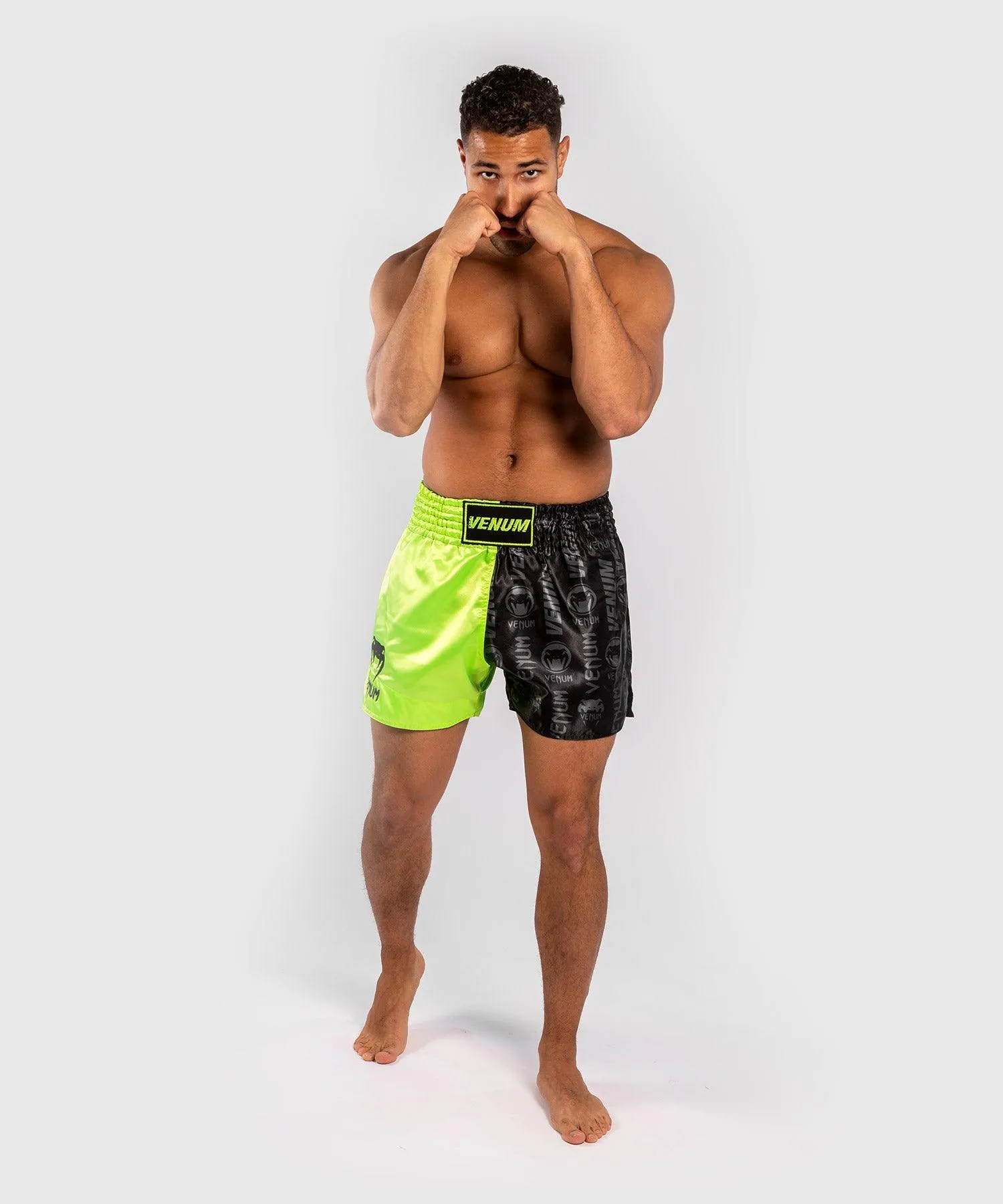 Pantalones cortos Venum Logos Muay Thai - Negro/Amarillo